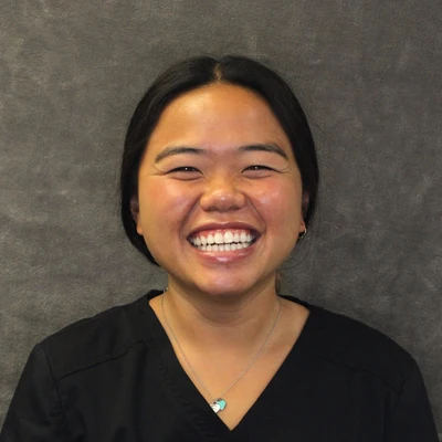 A headshot of Kat, a staff member of Melanie Parker Orthodontics.