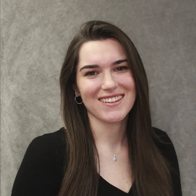 A headshot of Micaela, a staff member of Melanie Parker Orthodontics.