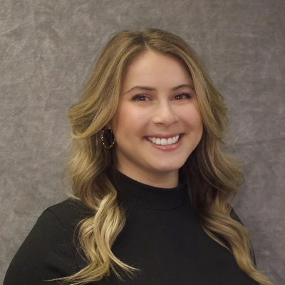 A headshot of Stacie, a staff member of Melanie Parker Orthodontics.