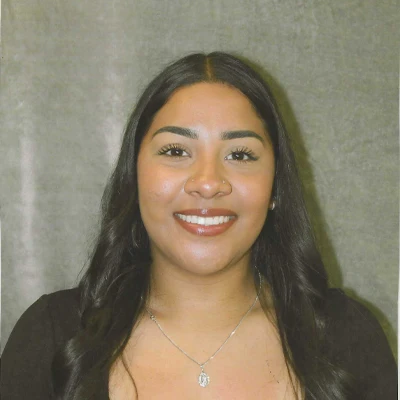 A headshot of Valeria, a staff member of Melanie Parker Orthodontics.
